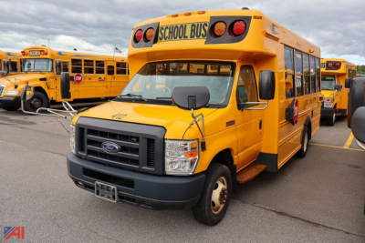 2019 Ford Blue Bird E-Series school bus, front view with 'SCHOOL BUS' sign, yellow body and black grille.