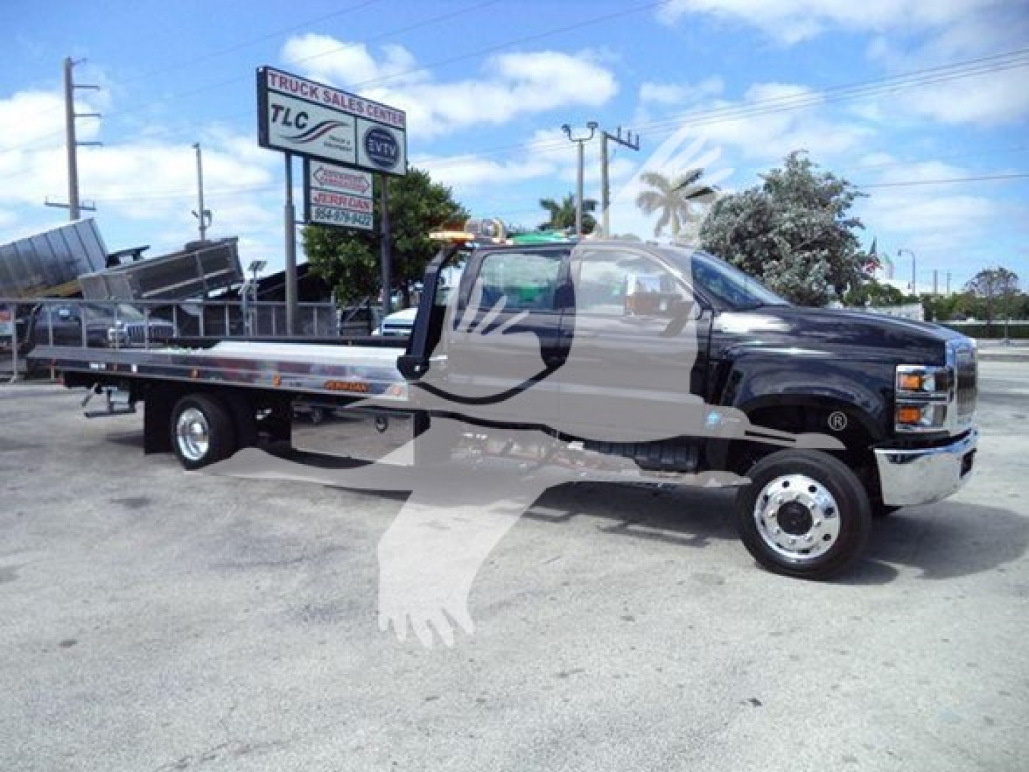 2023 International CV rollback tow truck with long flatbed, chrome wheels, cab and chassis, VIN 1HTKTSWK9PH419807, stock J19807, new unit.
