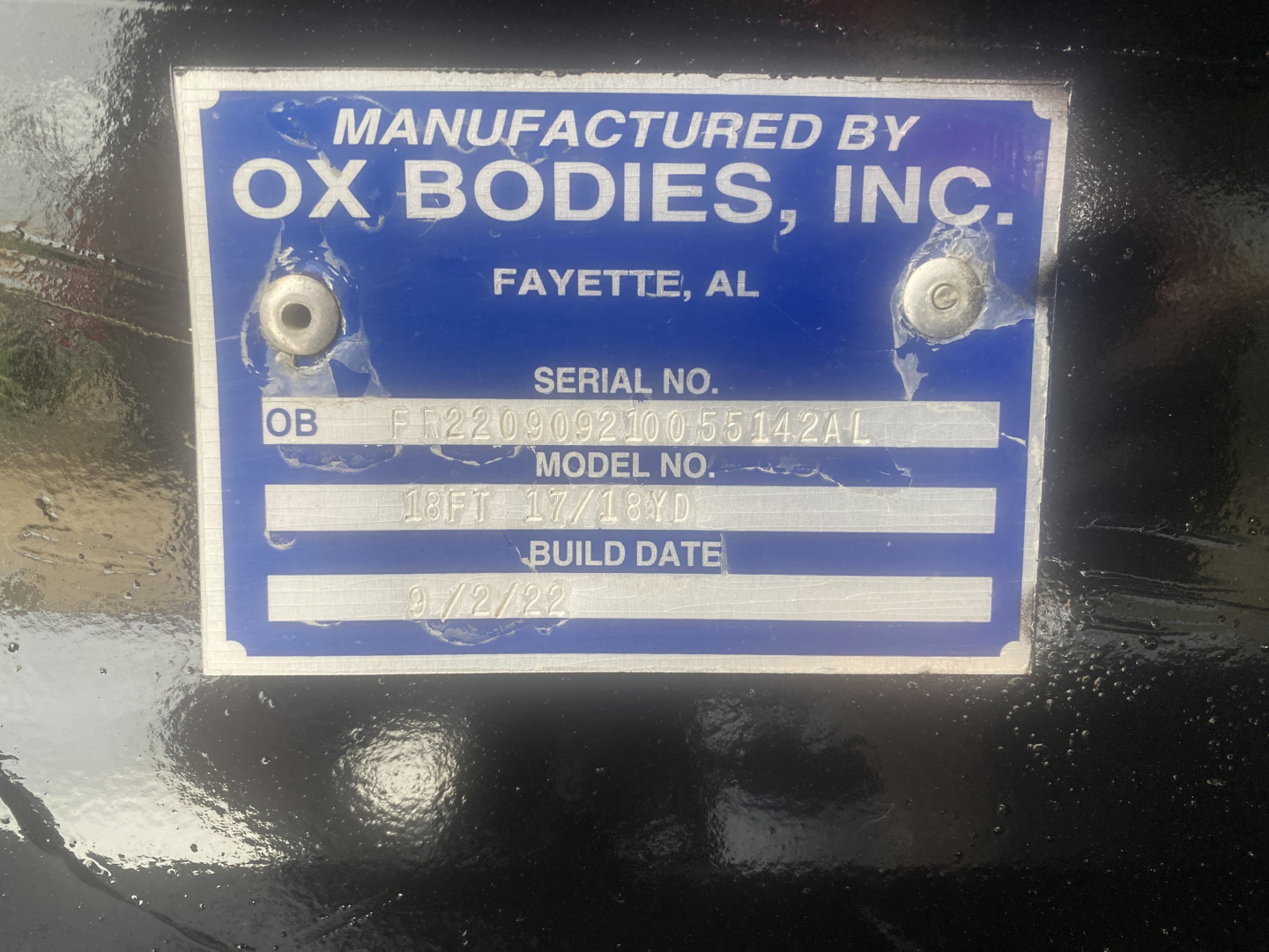 Plate reading MANUFACTURED BY OX BODIES, INC. FAYETTE, AL SERIAL NO. OB  L F2209???21005514ZAL MODEL NO.  BUILD DATE  03/??