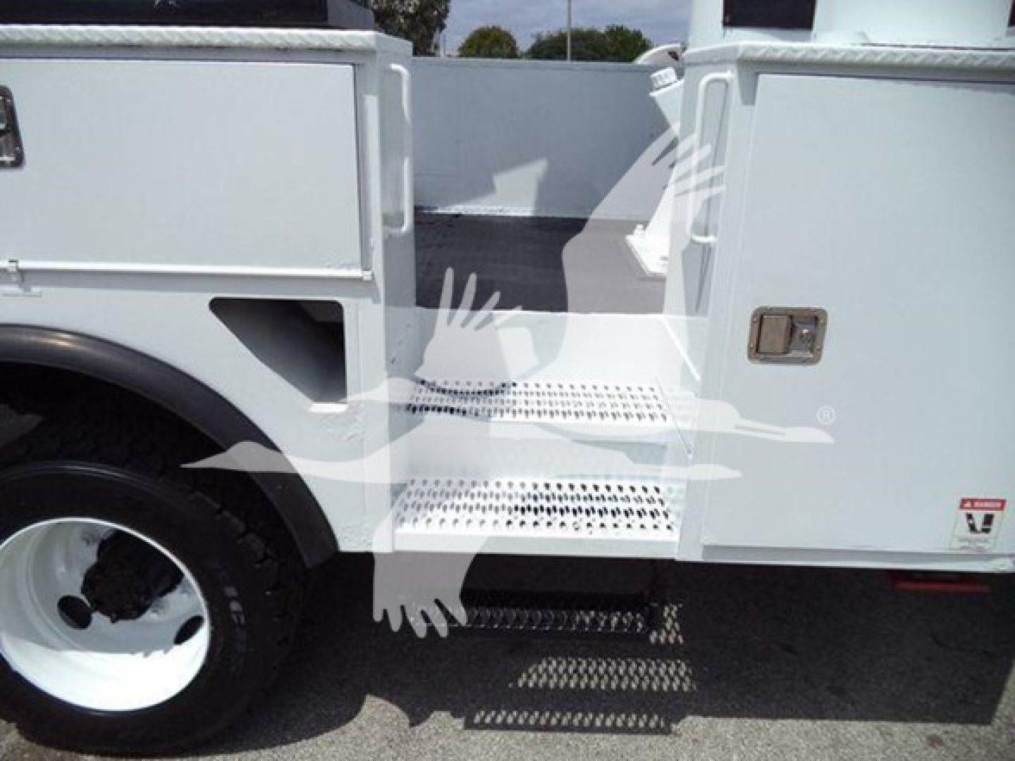 Versalift VST40i crane equipment entry with stairs and side steps visible.