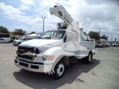 Versalift VST40i crane truck in-service showing boom lift extended on white utility truck side-view.