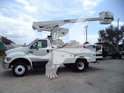 Versalift VST40i bucket truck crane on a white utility truck side view showing boom extended.