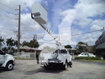 Versalift VST40i crane truck in a parking lot showing the crane assembly extended overhead.