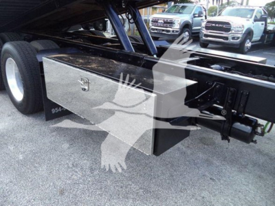 Toolbox mounted under Freightliner M2 106 trailer chassis with open area and dual rear wheels visible