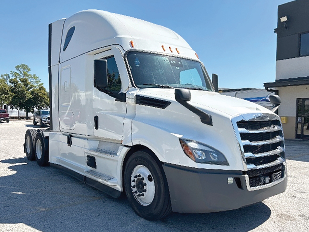 Truck cab showing 2021 Freightliner Cascadia126 conventional sleeper with VIN 3AKJHHDR4MSMY5717 and stock number 550543.