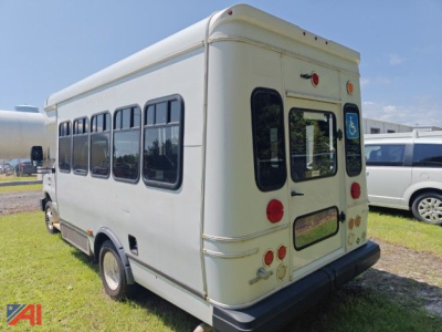 Ford E-350 wheelchair bus rear and side view showing windows and rear doors