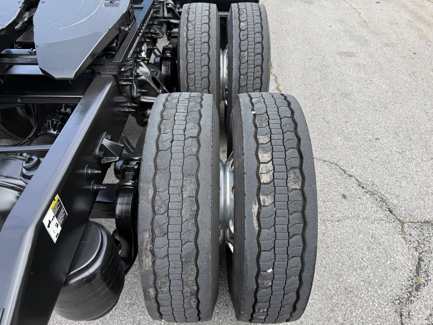 Peterbilt truck chassis with dual rear axles and tires visible; no readable labels or fluid markings visible in this crop.