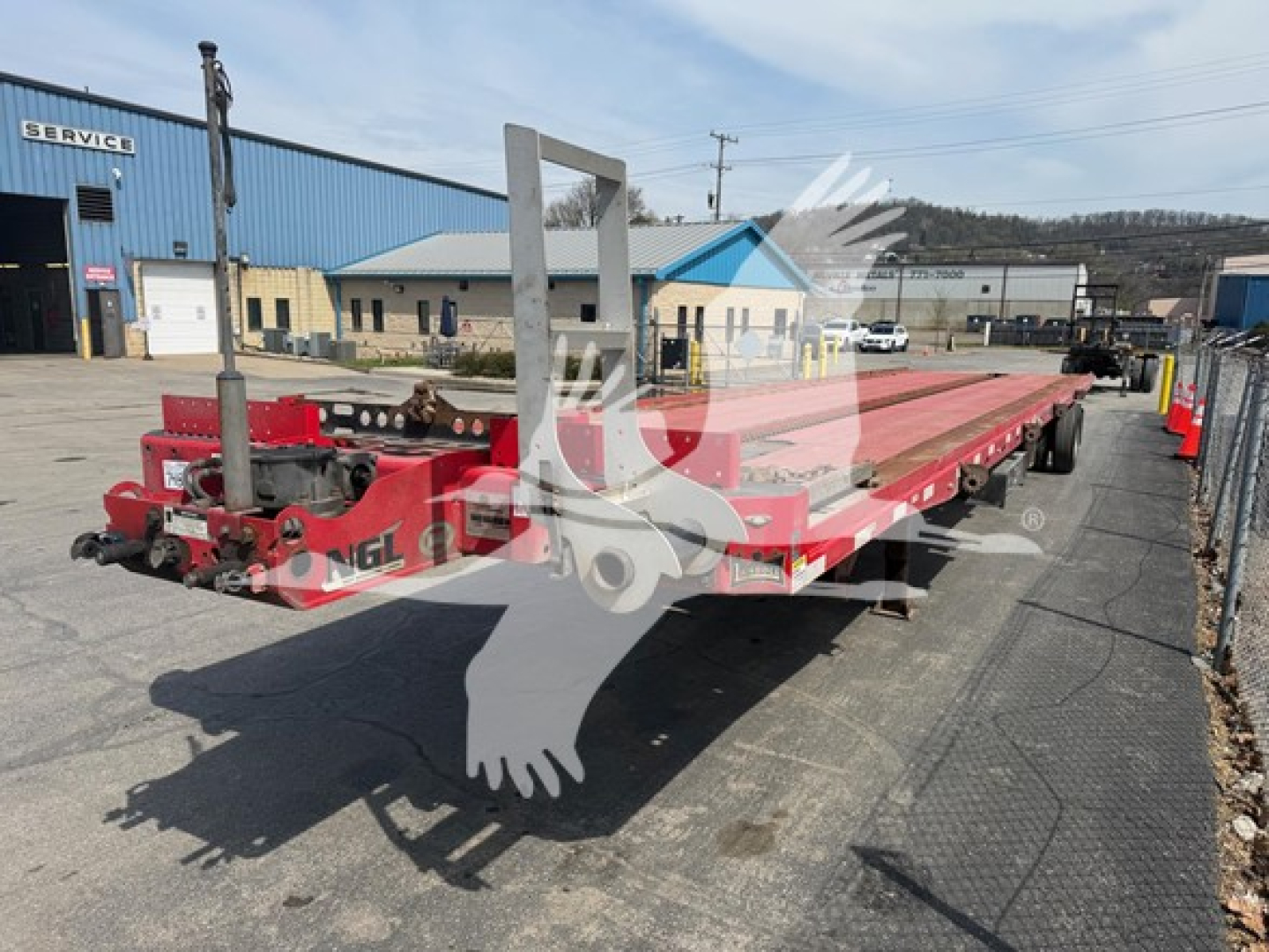 2018 Landoll 343B trailer in service showing red flatbed and loading ramps, VIN 1LH343RG3J1A25555, stock 7483