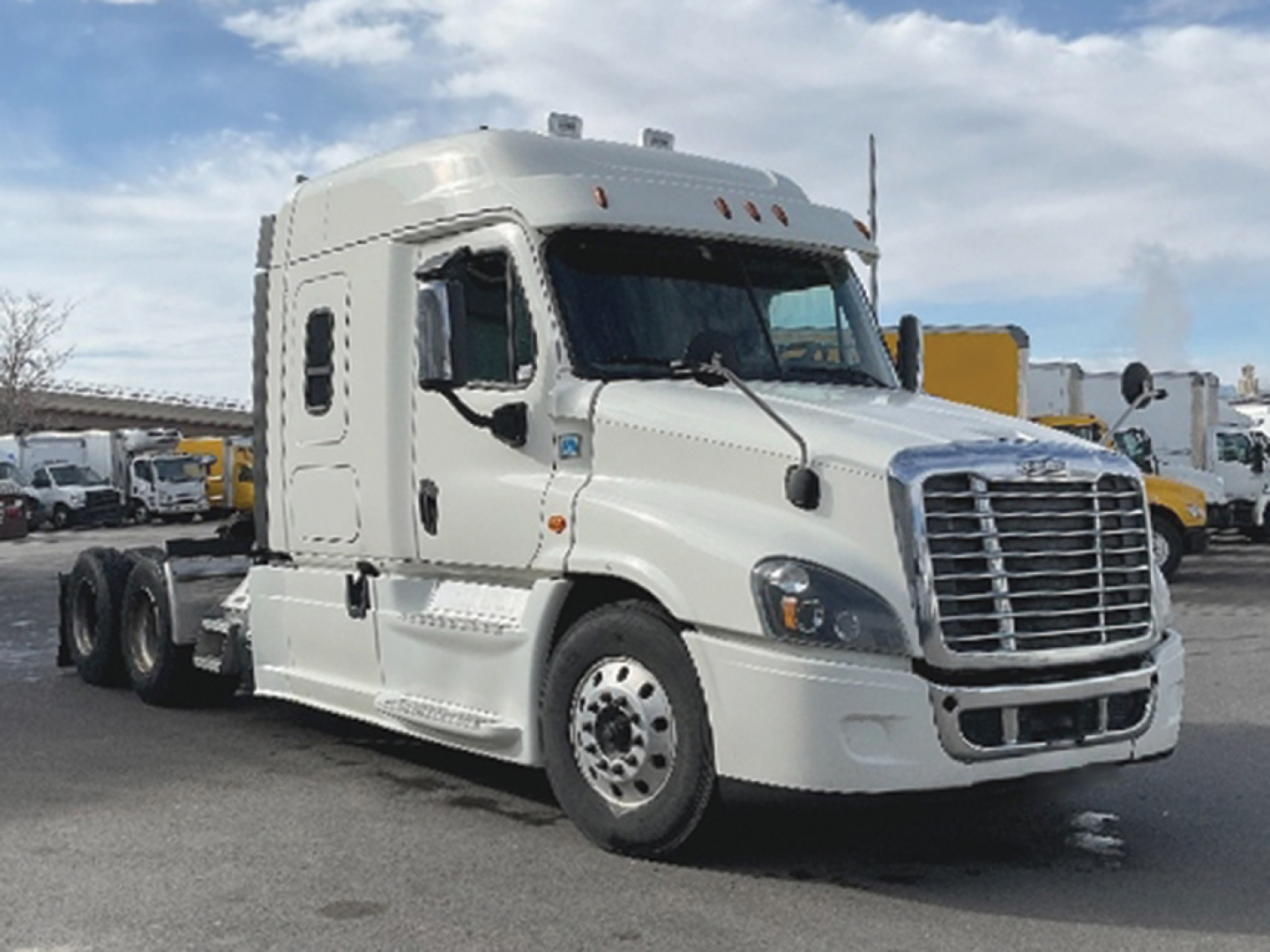 Freightliner Cascadia125 tractor vacuum showing side view with sleeper cab and chrome grille.
