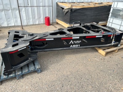 ASB1 55-ton spreader bar trailer side profile showing Alpha label and model ASB1 with structural rails on a lowboy frame.