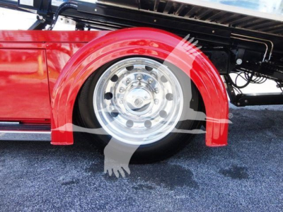 Peterbilt 337 rollback truck wheel and red fender shown in side view