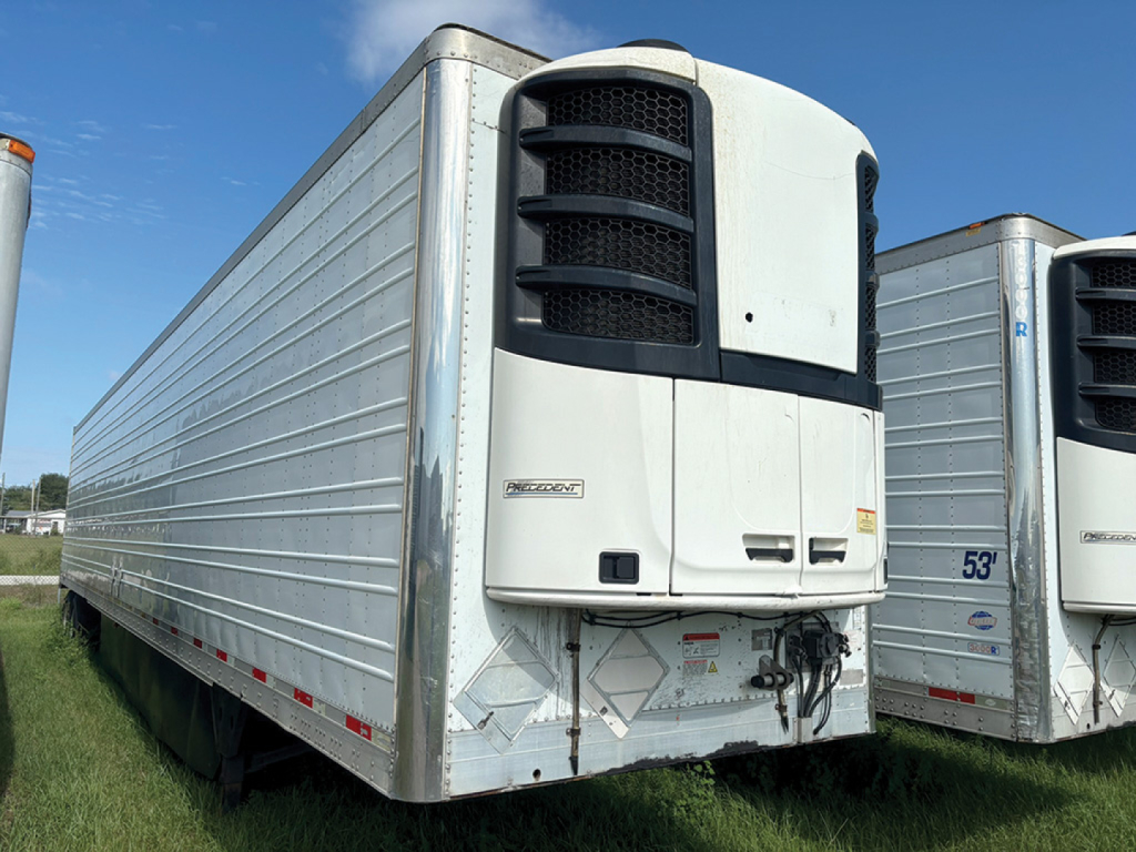 2014 Utility 3000R refrigerated trailer front view showing York/Carrier style reefer unit and corrugated aluminum sides