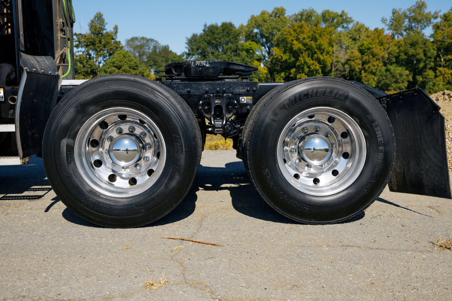 Peterbilt 579 chassis with dual rear axles and polished wheel rims visible
