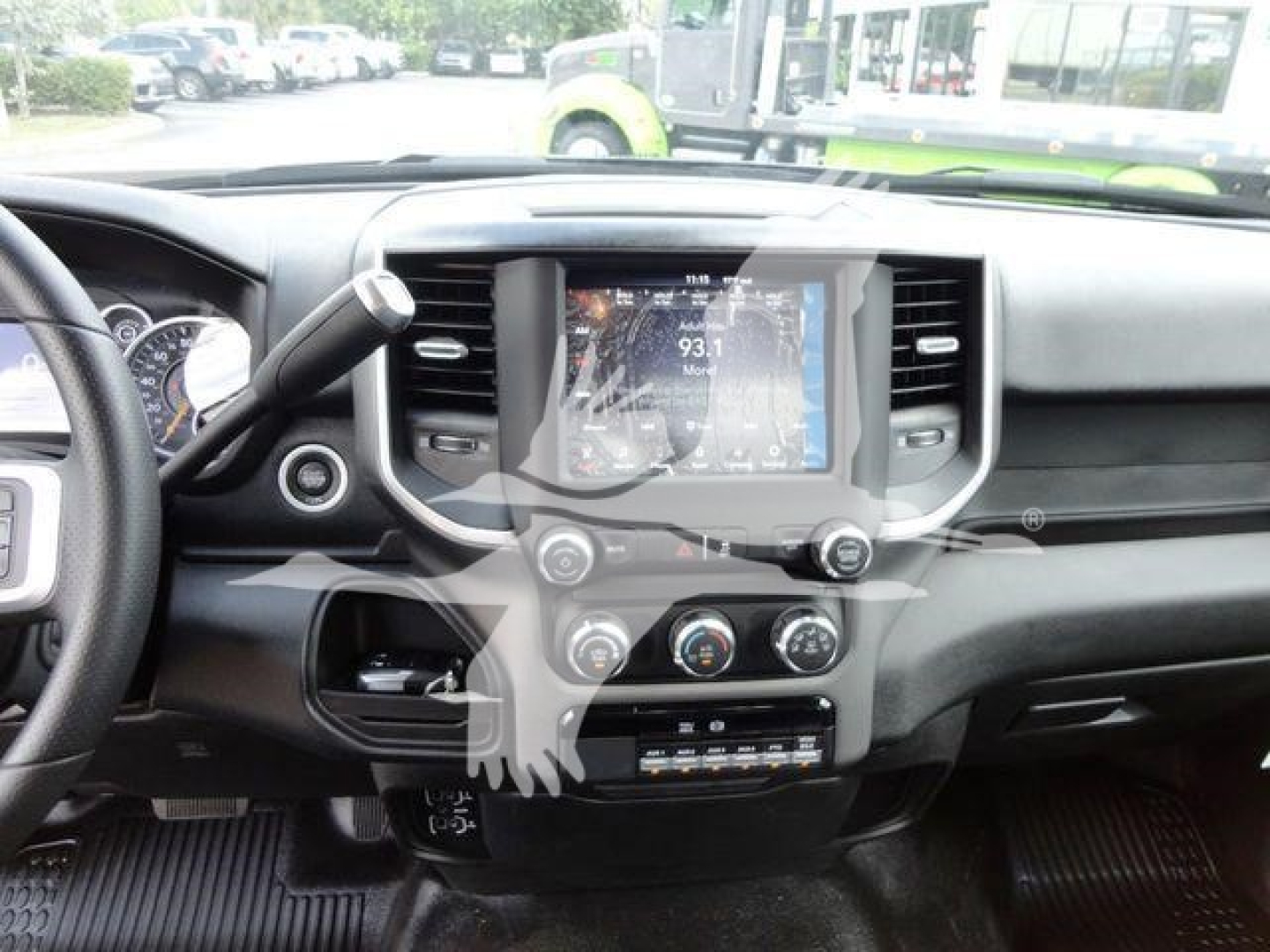 Ram interior photo showing center touchscreen display and climate controls in a 2024 Ram 4500HD SLT dashboard view.