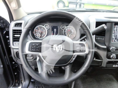 Ram 4500 HD SLT interior dashboard steering wheel view showing steering wheel controls and instrument cluster