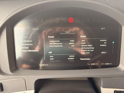 Kenworth T680 dashboard screen showing vehicle information: chassis number 144004?, engine Cummins, software version, trip data; ABS details; transmission details.