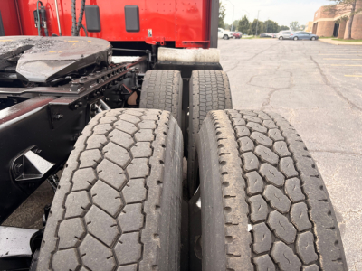 Kenworth T680 chassis and dual rear tires view showing heavy-duty truck frame and wheels.