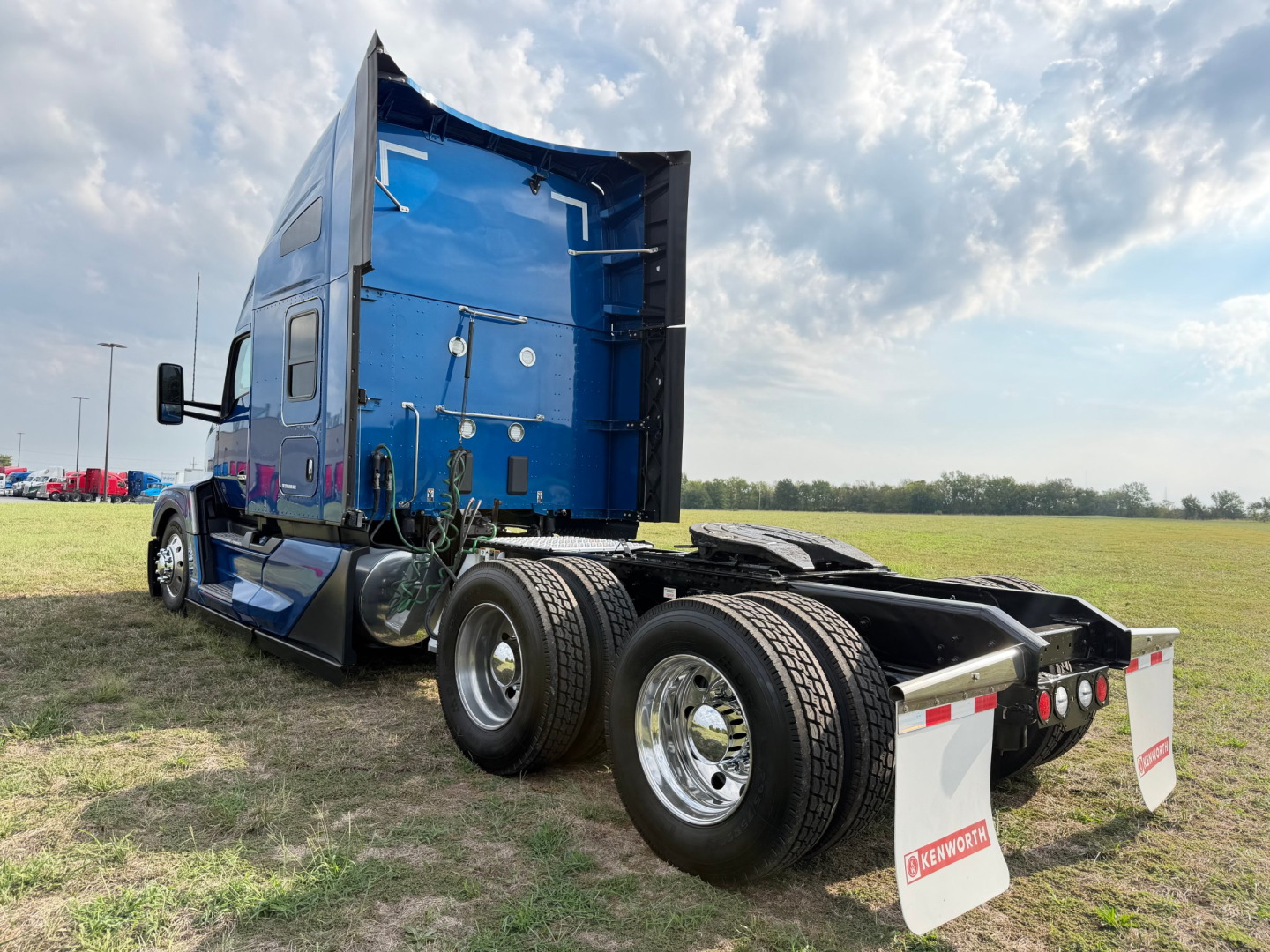 Kenworth T680 sleeper cab tractor shown from rear-left side with blue exterior and dual rear axles, stock tag 0631661, VIN 1XKYD49X9RJ382779