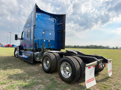 Kenworth T680 sleeper cab tractor shown from rear-left side with blue exterior and dual rear axles, stock tag 0631661, VIN 1XKYD49X9RJ382779