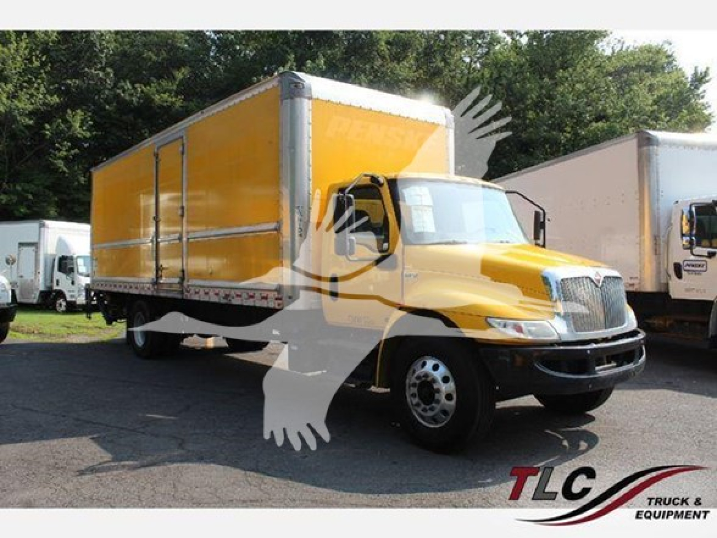 Box truck showing yellow cargo box on a prompt International MV chassis with stock number T25710.