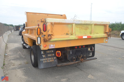 Ram 3500 dump truck bed rear view showing tailgate hinges and signs