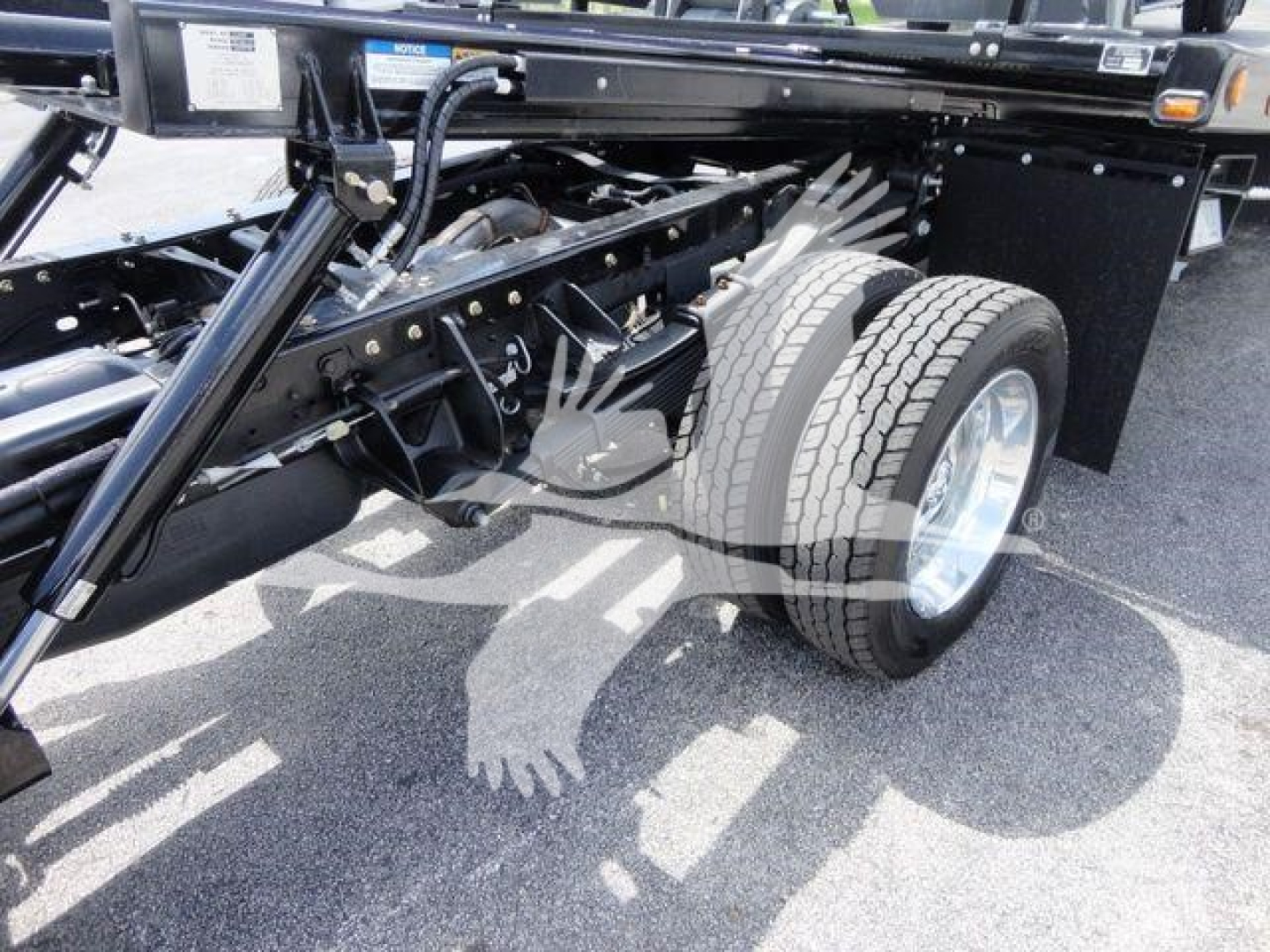 Ram 5500 chassis and dual rear wheels showing suspension and frame components.