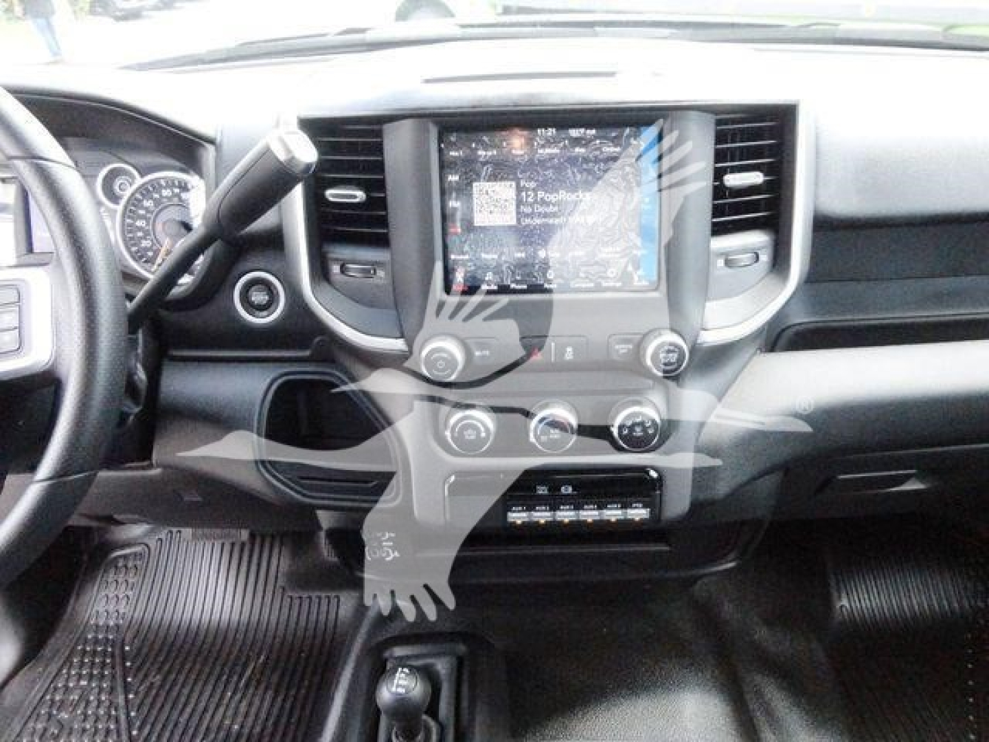 Ram 5500 dashboard and center console with touchscreen display and climate controls visible.