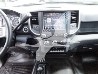 Ram 5500 dashboard and center console with touchscreen display and climate controls visible.