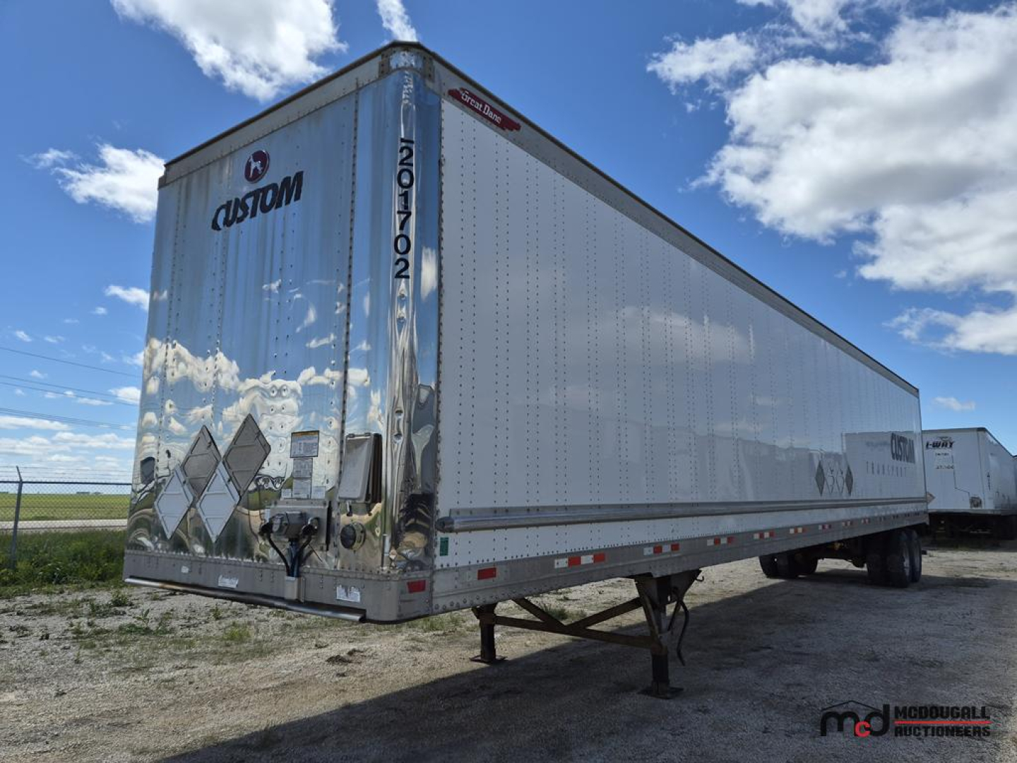 2017 Great Dane 53' dry van trailer showing rear and side with Custom logo and reflective decals.