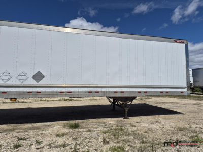 Great Dane 53' dry van trailer side view showing front nose and landing gear with white exterior.