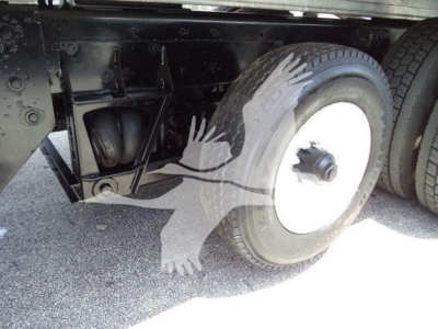 Kenworth T370 undercarriage showing rear dual tires and suspension components