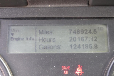 Dashboard display showing Miles 748924.5, Hours 20167.12, Gallons 124186.8 on Freightliner Cascadia 125 truck instrument panel