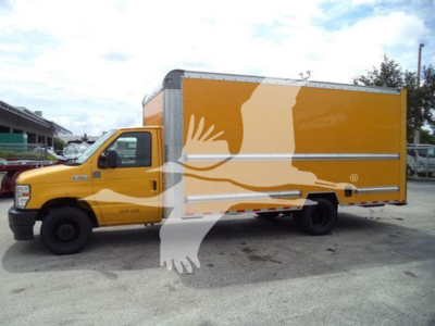 Ford E-350 box truck side view showing yellow cargo box and cab with stock number T04043 and VIN 1FDWE3FN1NDC04043