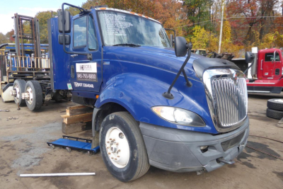 Blue 2012 International ProStar+ 122 conventional daycab truck with front view, VIN sticker visible, stock number 0530235.