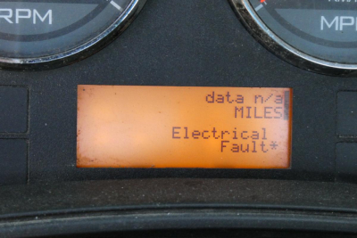 Dashboard display showing 'data n/o? MILES' and 'Electrical Fault' message in an International ProStar+ 122 truck.