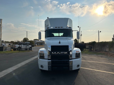 Mack AN64T conventional daycab truck front view showing grille with MACK lettering and bumper