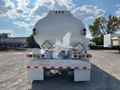Rear view of a 2019 Heil 9200Gal gasoline fuel trailer showing rear lights, reflective tape, and access hatches.