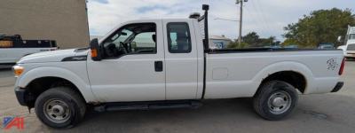Ford F-250 Super Duty pickup with extended cab and dual rear wheels showing side profile.