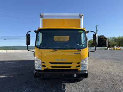 Isuzu NPR box truck front view showing yellow cab and cargo box.