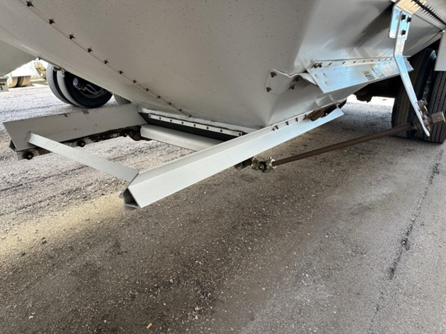Hopper trailer undercarriage showing frame and support beams of a 2015 Timpte Super Hopper.