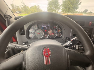 Kenworth T680 interior dashboard and steering wheel with gauge cluster visible