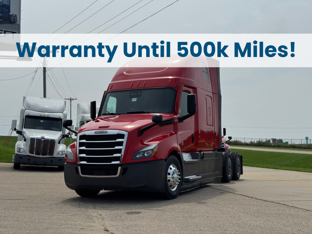 Freightliner Cascadia 126 tractor in red with banner text Warranty Until 500k Miles across top.