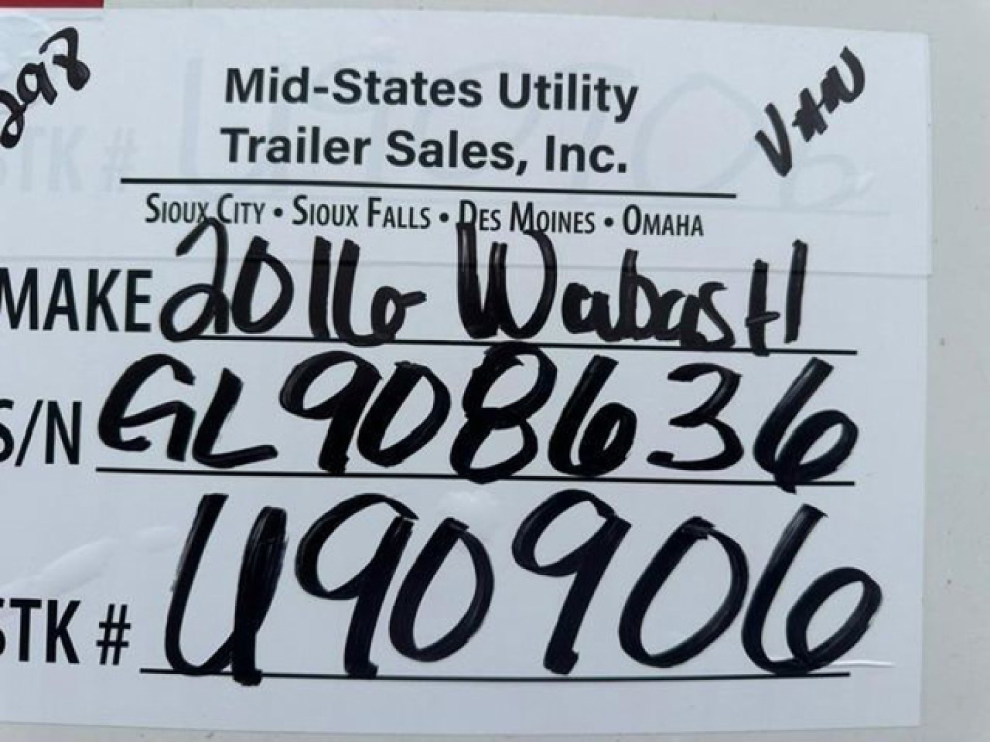 Label showing Mid-States Utility Trailer Sales, Inc. sticker with handwritten make 2016 Wabash, VIN 1JJV532D2GL908636, stock U90906, handwritten S/N G L 908636, U90906, on a trailer tag.
