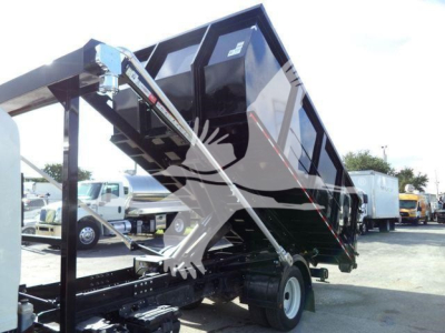 Isuzu NRR rolloff truck rear view with tipped dump bed and hydraulic hoist, no legible labels visible on body in this image.