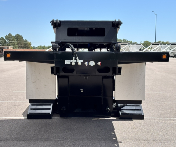 Front view of a new Alpha A80 HDGC-E 48' lowboy trailer with hydraulic detach double drop extendable. Features include black frame, rear support, metal panels, and reflectors.