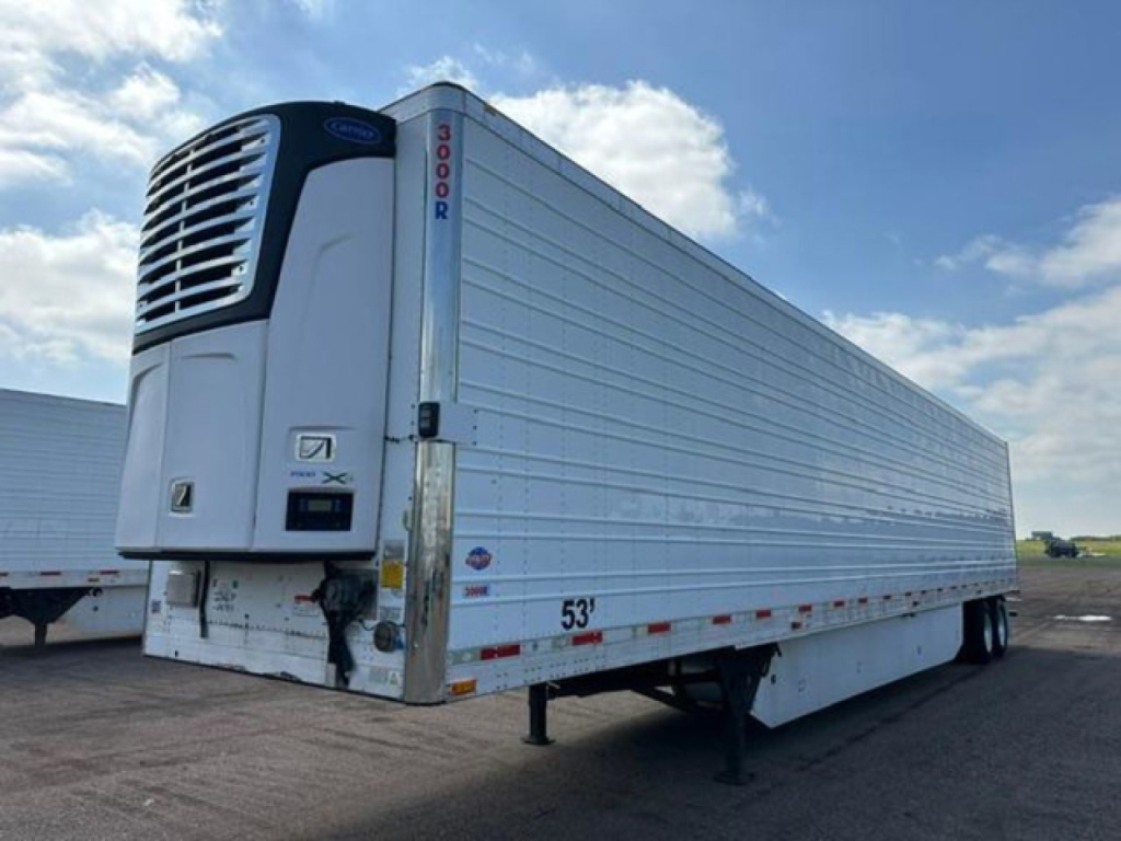 Refrigerated trailer in side view showing carrier reefer unit at front and 53' length markings visible.