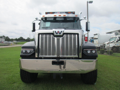 Western Star 49X dump truck front view showing large chrome grille and bumper.