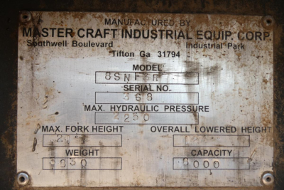 Master Craft Industrial Equip. Corp. plate showing model 8SNR, serial no. 663, max hydraulic pressure 2250, max fork height ?, overall lowered height ?, weight 9330, capacity 8000. Southwestern Boulevard Tifton GA address.