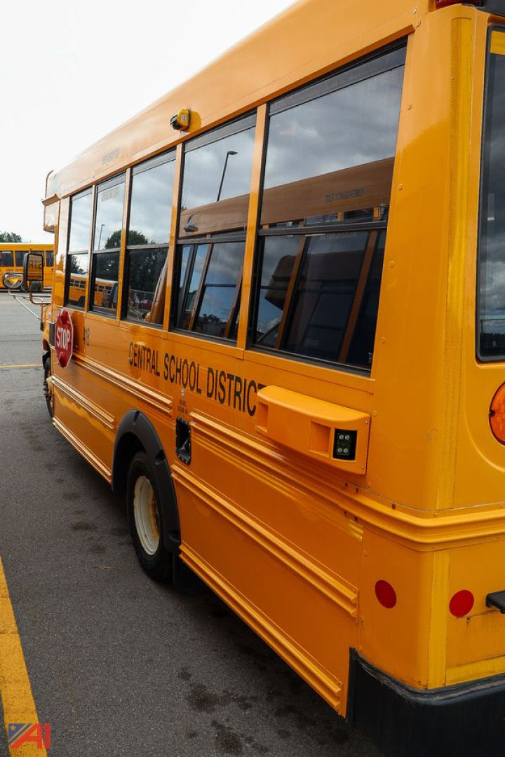 Ford Blue Bird school bus side view showing Central School District lettering and windows