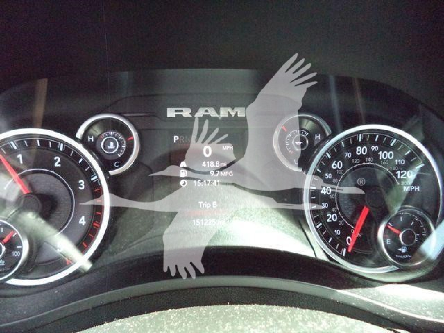 Ram 5500 instrument cluster showing speedometer and gauges with digital display in center.